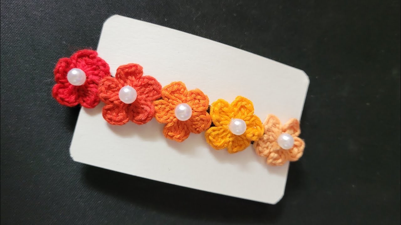 Learn how to decorate hair clip using crochet flowers tutorial.