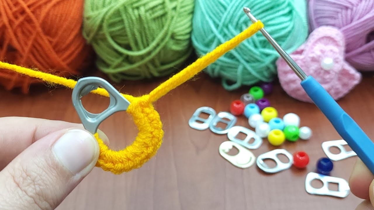 I made a crochet miniature bag keychain with a pull-on ring. It turned out great.