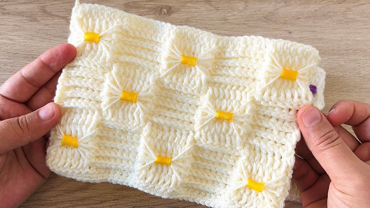 The most beautiful crochet bow blanket pattern. tie-up baby blanket. blanket with organized ribbon