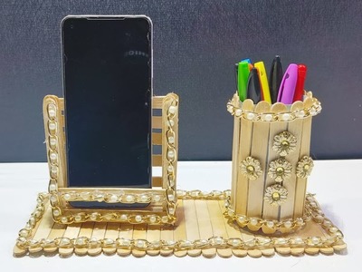 Beautiful diy- icecream stick mobile stand.pen stand.mobile holder.pen holder. y craft