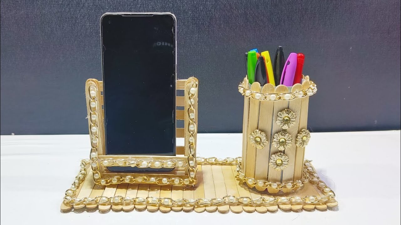 Beautiful diy- icecream stick mobile stand.pen stand.mobile holder.pen holder. y craft