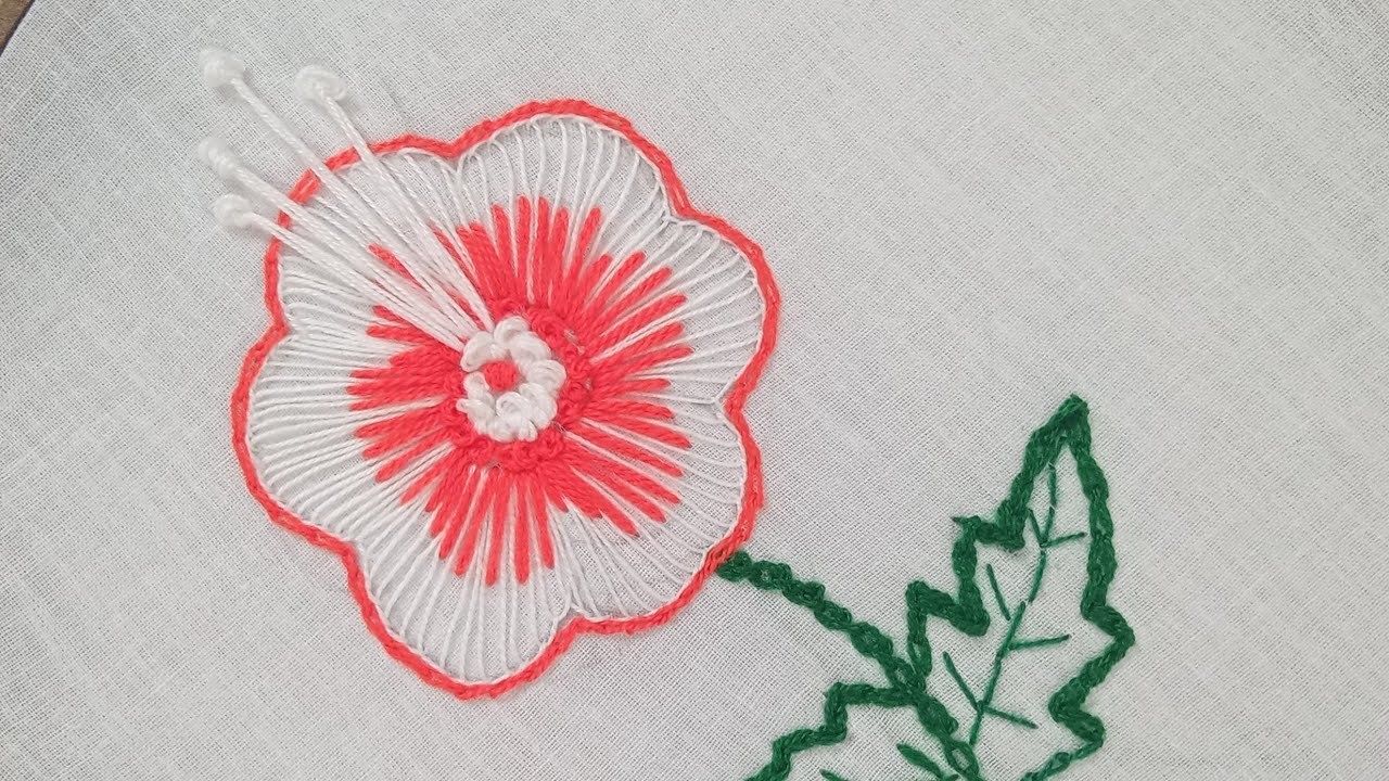 Hand Embroidery design.Hand embroidery of a flower with buttonhole stitch and french knots ফুল সেলাই