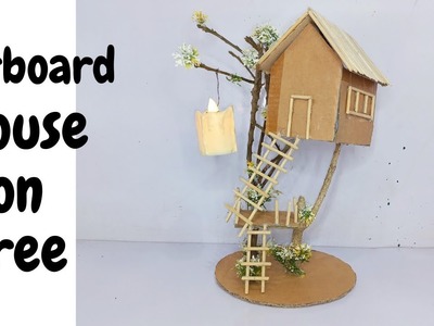 BEAUTIFUL ! DIY . a house on a tree with candle | cardboard tree house