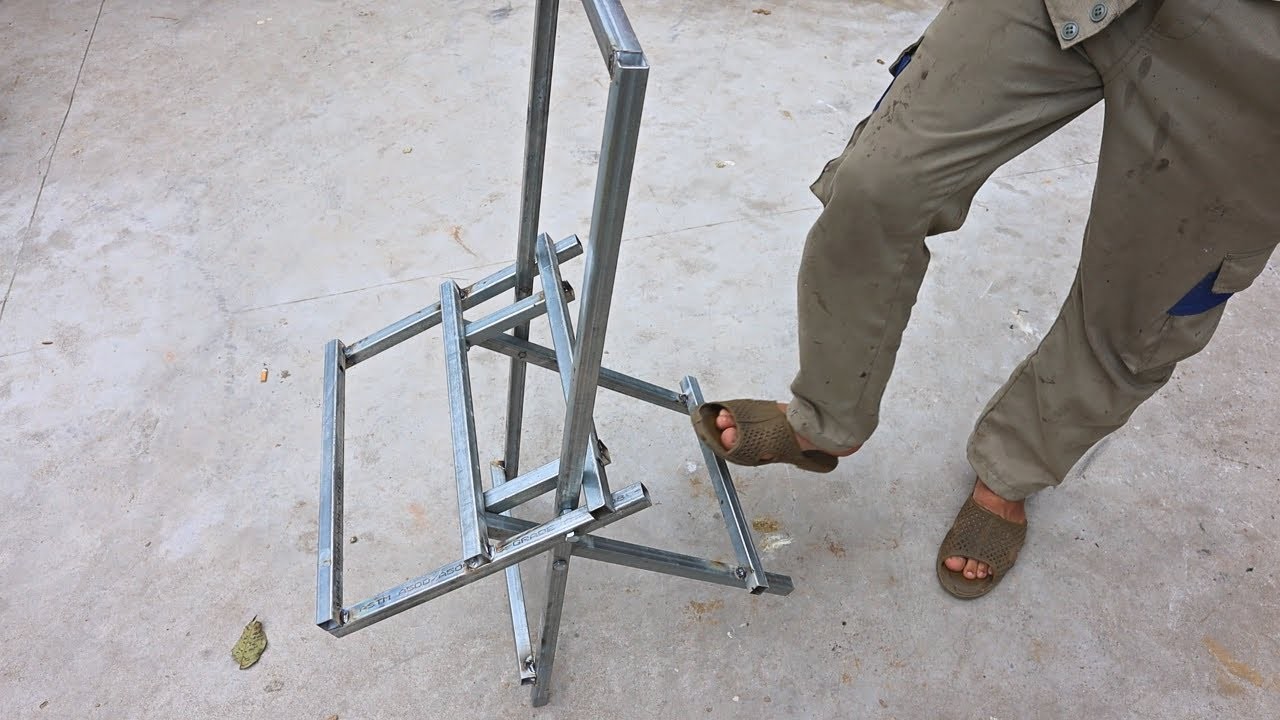 Great idea for a smart folding chair. Diy folding chair from metal and wood