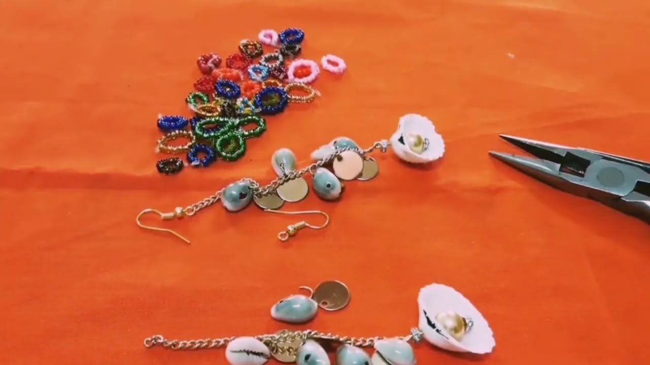 How to make earrings with seashells and pearls. Trends for the summer