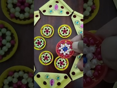 SKYS BEADS CREATIONS - # 254 -  REARRANGEABLE RANGOLI WITH PLASTIC BOX LID.