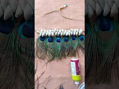 Shell jewellery making.feather jewellery making. morpankh jewellery. peacock feather jewellery