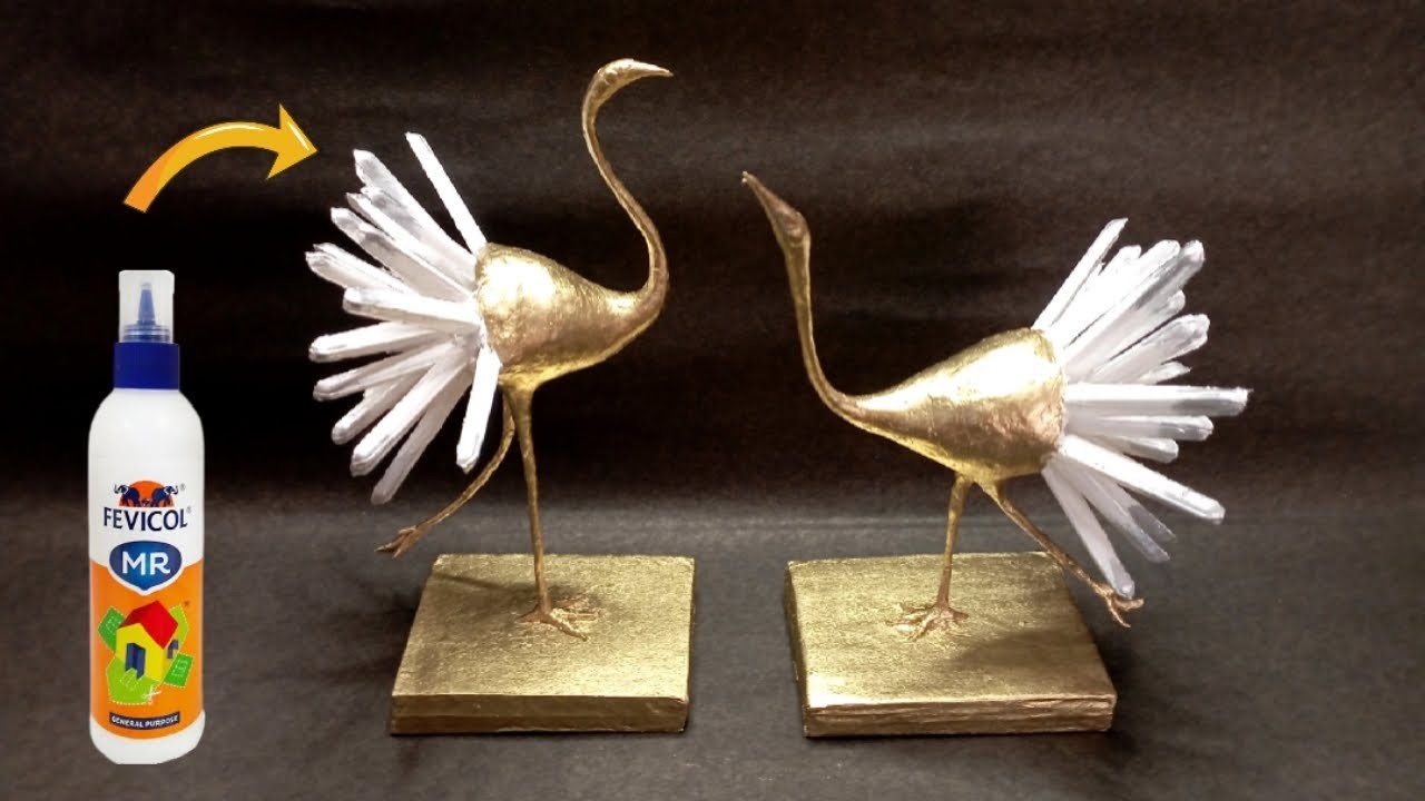 Home decor show piece.Ostrich couple homemade clay sculpture.DiY homemade decor.diy easy crafts