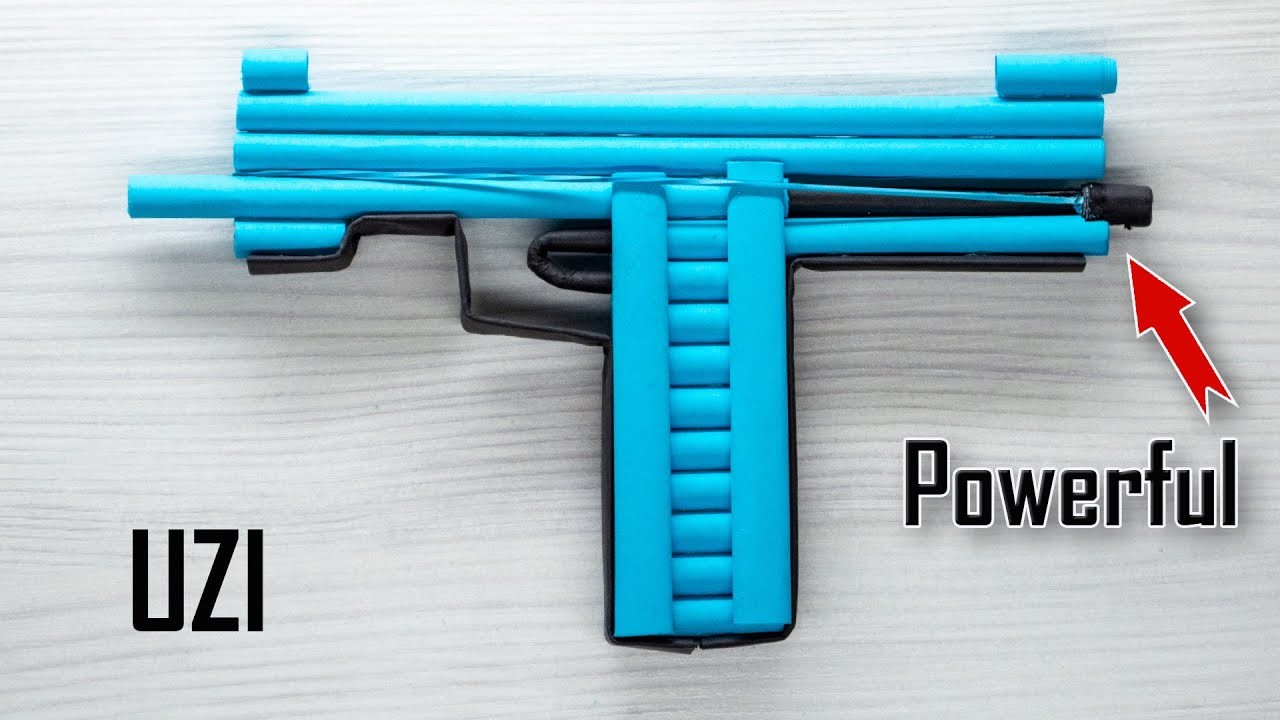 Making A Powerful PAPER GUN UZI that shoots paper bullets - Easy Origami Weapons