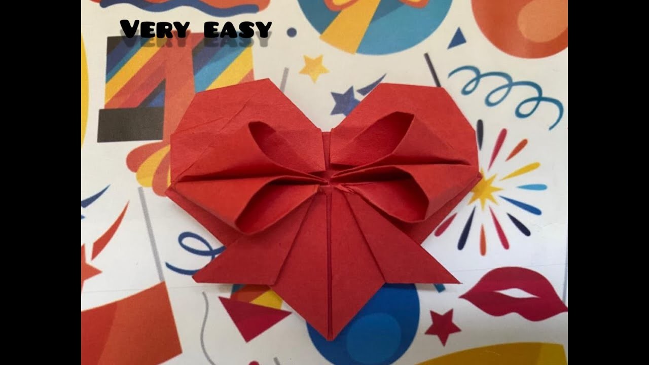 Paper heart with bow. Easy origami paper heart.DIY origami paper craft. easy craft in origami sheet