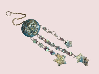 Learn to create a sun catcher using polymer clay, a moon mold and crystals - tutorial