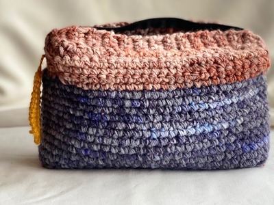 Super soft ribbon yarn crochet handbag.makeup bag turned out really nice.