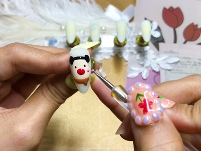 Geraldine Cortez Bridget Goodman - white christmas nails - snowflake nail art