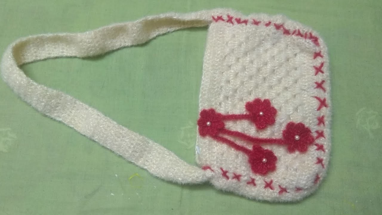 Woolen design. woollen baby purse. #woollen latest design. (@Renuka creation)