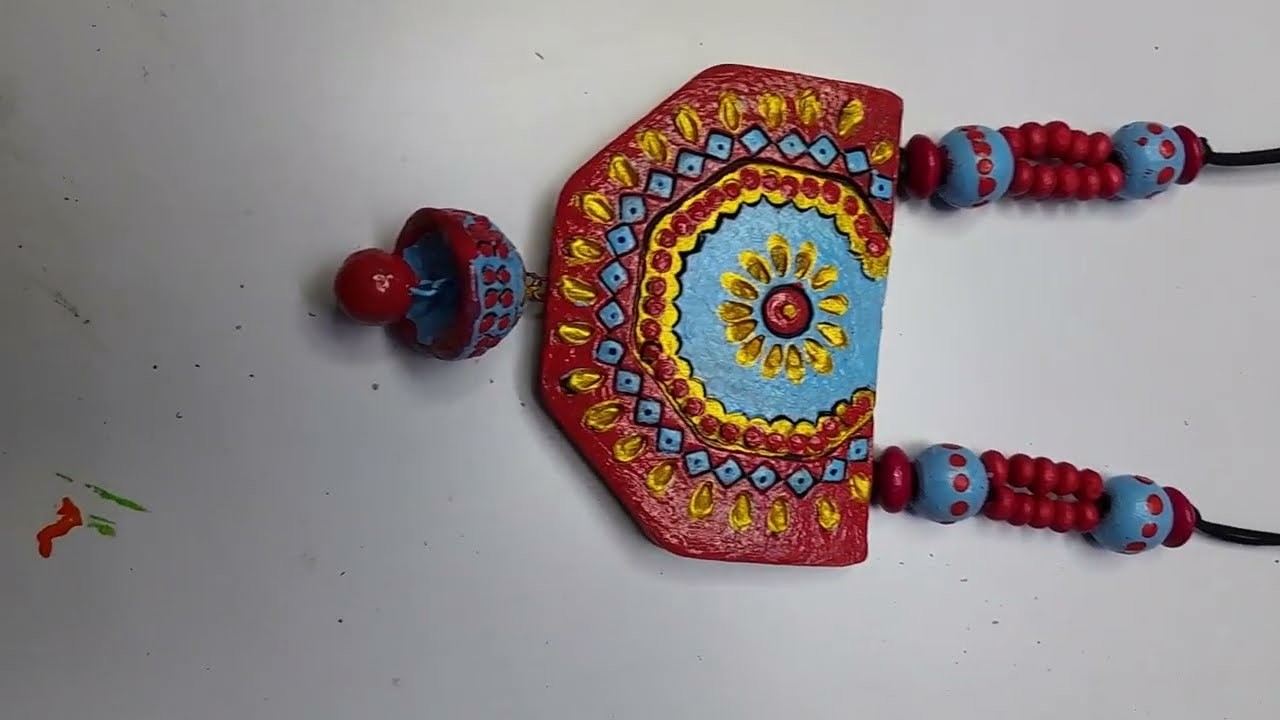 Terracotta  jewellery  pendant  painting