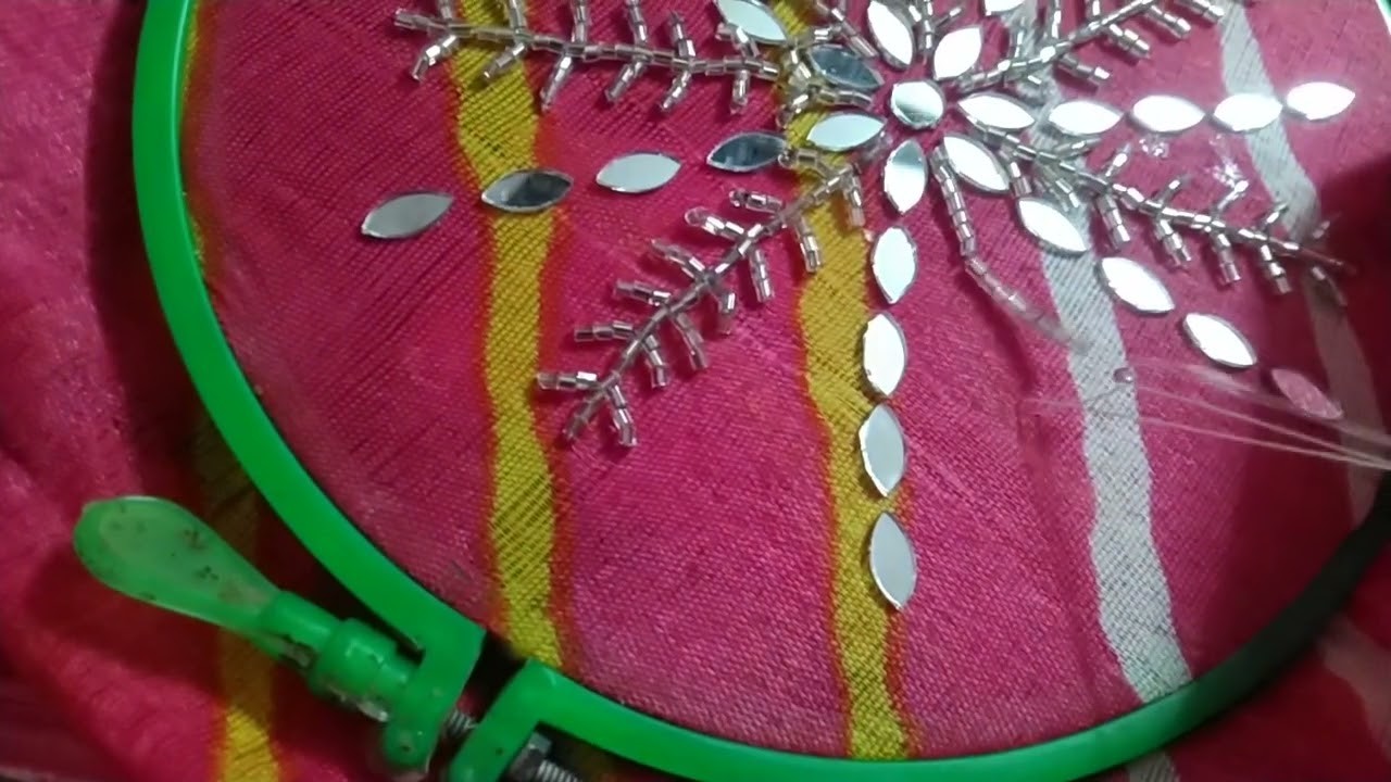 Embroidery idea for a potali bag mirror work rod embroidery embroidery hoop mirror idea  craft diy