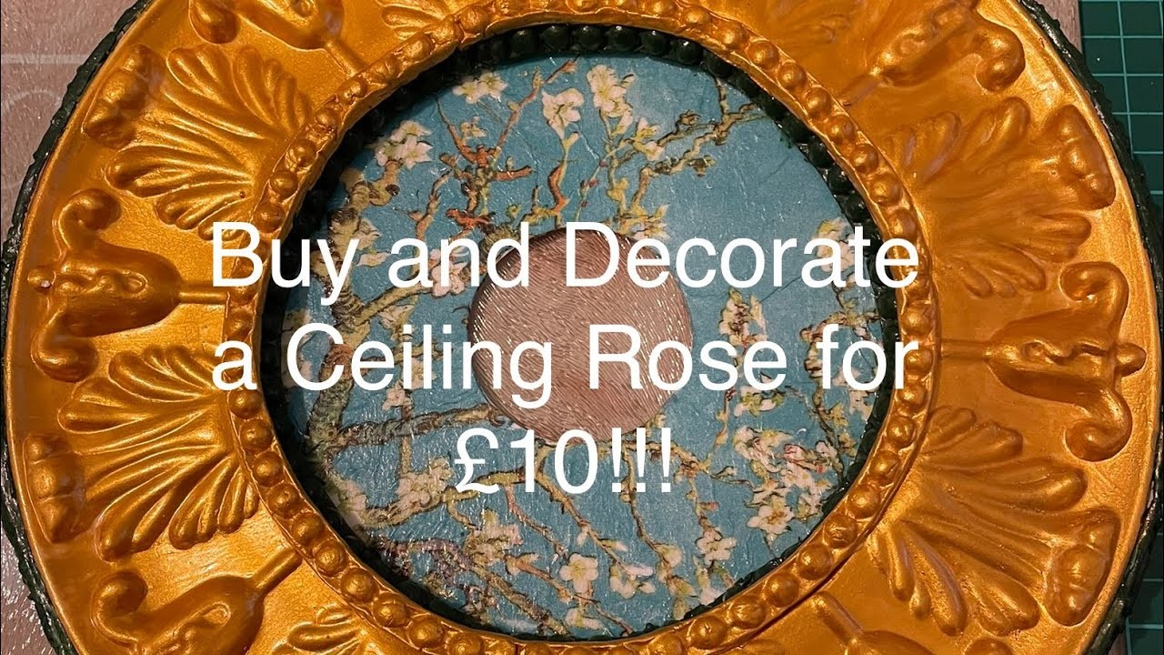 Buy and decorate a ceiling rose for around £10!!