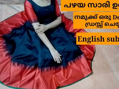 Trending desingner dress cutting and stiching using old saree in malayalam.saree reuse idea