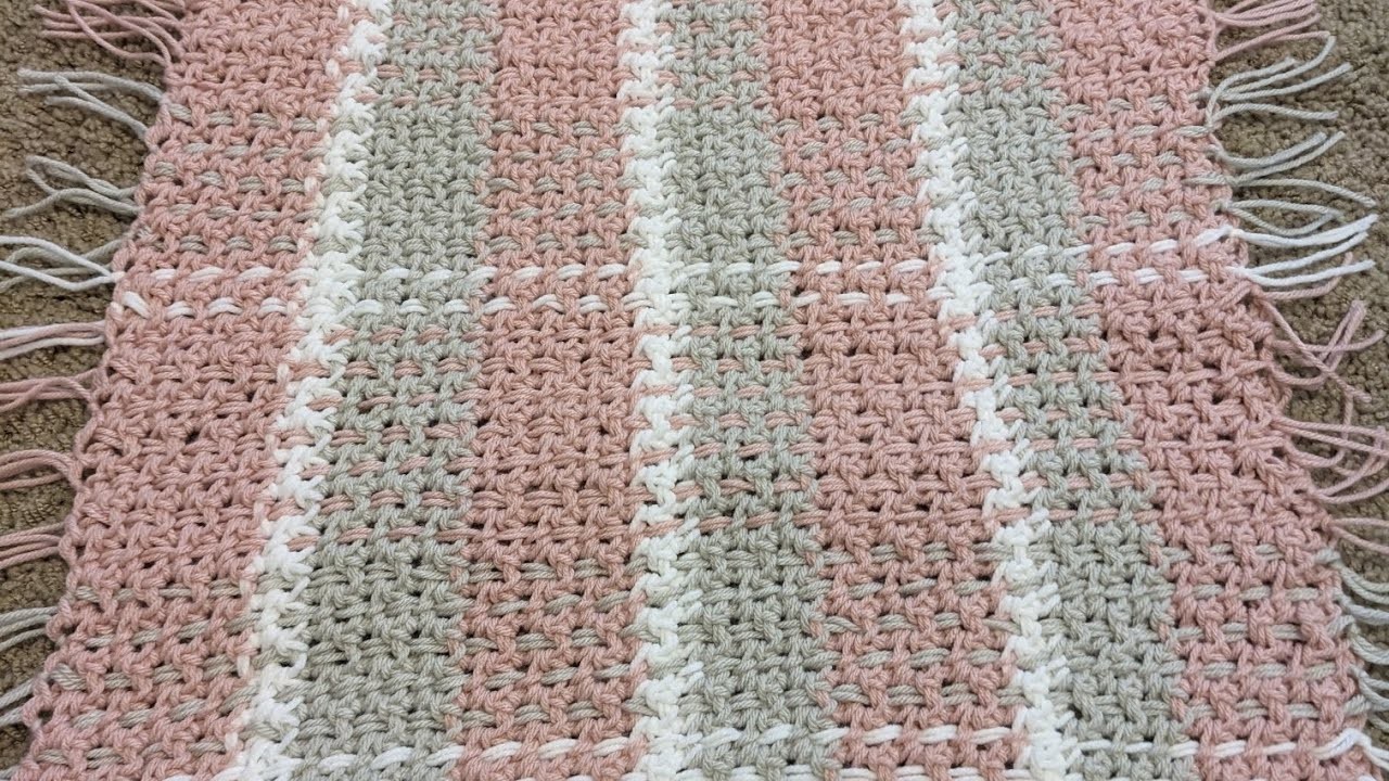 Make a blanket with me - weaving in yarn to make a plaid crochet baby blanket