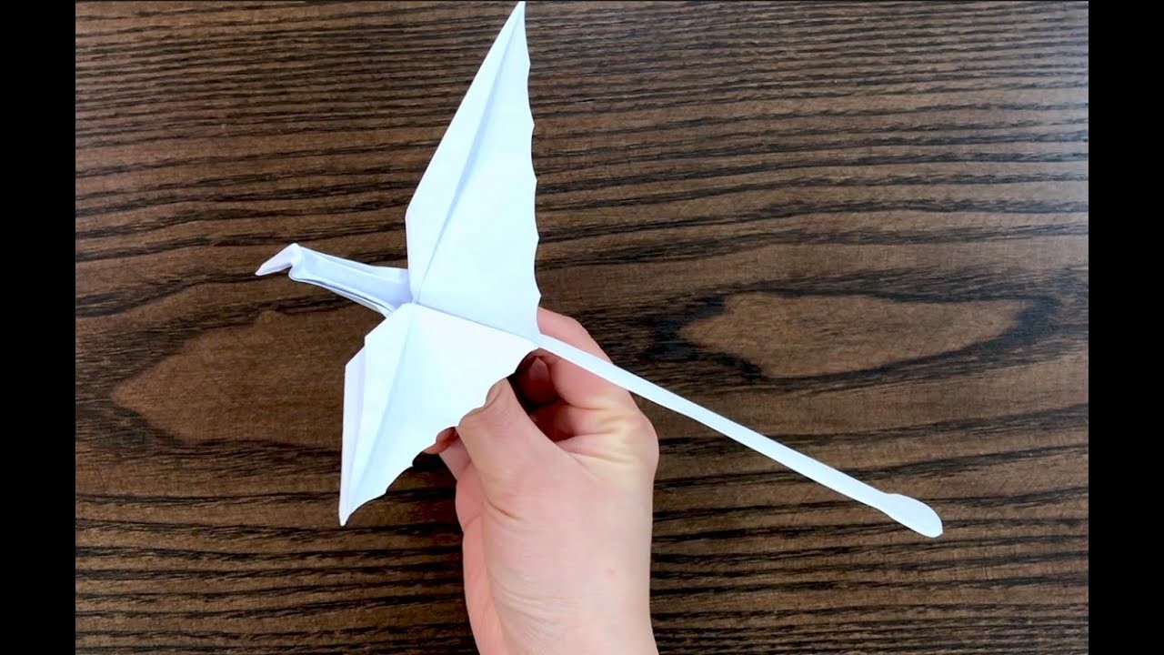 EASY ORIGAMI: How to fold a paper dinosaur airplane!