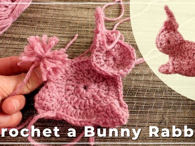 Crochet a bunny rabbit with a pompom tail