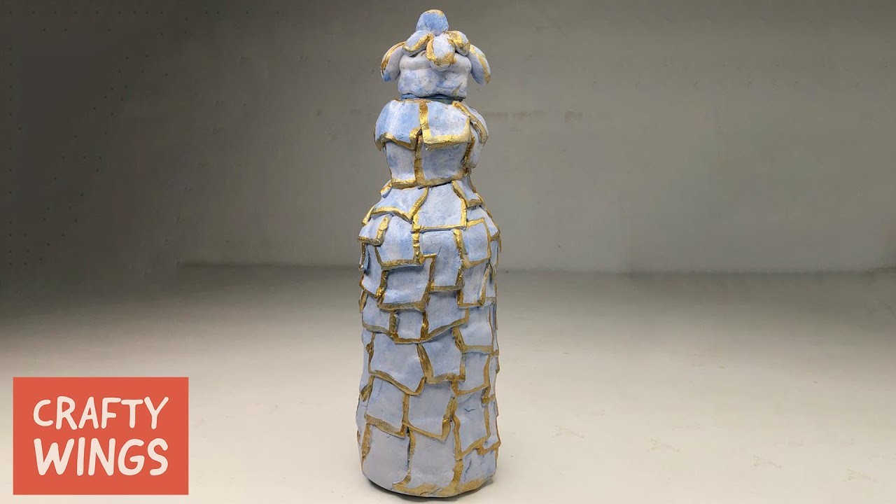 D.I.Y Bottle Art Using White cement || With Ceramic Finish || Crafty Wings