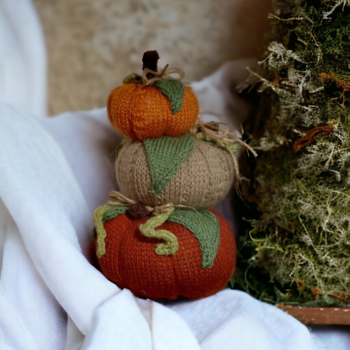 Hand knitted autumn pumpkin stack
