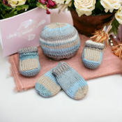 Handmade knitted newborn baby gift set comprising of mittens hat and booties