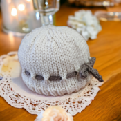 Handmade knitted newborn baby gift set comprising of mittens hat and booties