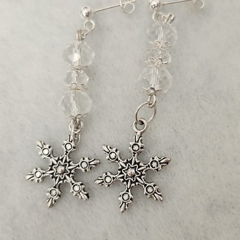 Beautiful dangling sterling silver snowflake earrings