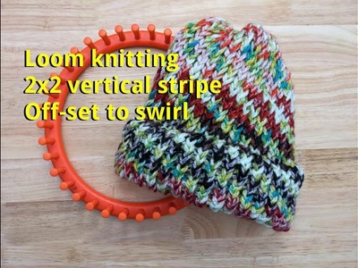 Loom knitting a hat with a 2x2 vertical stripe that swirls!