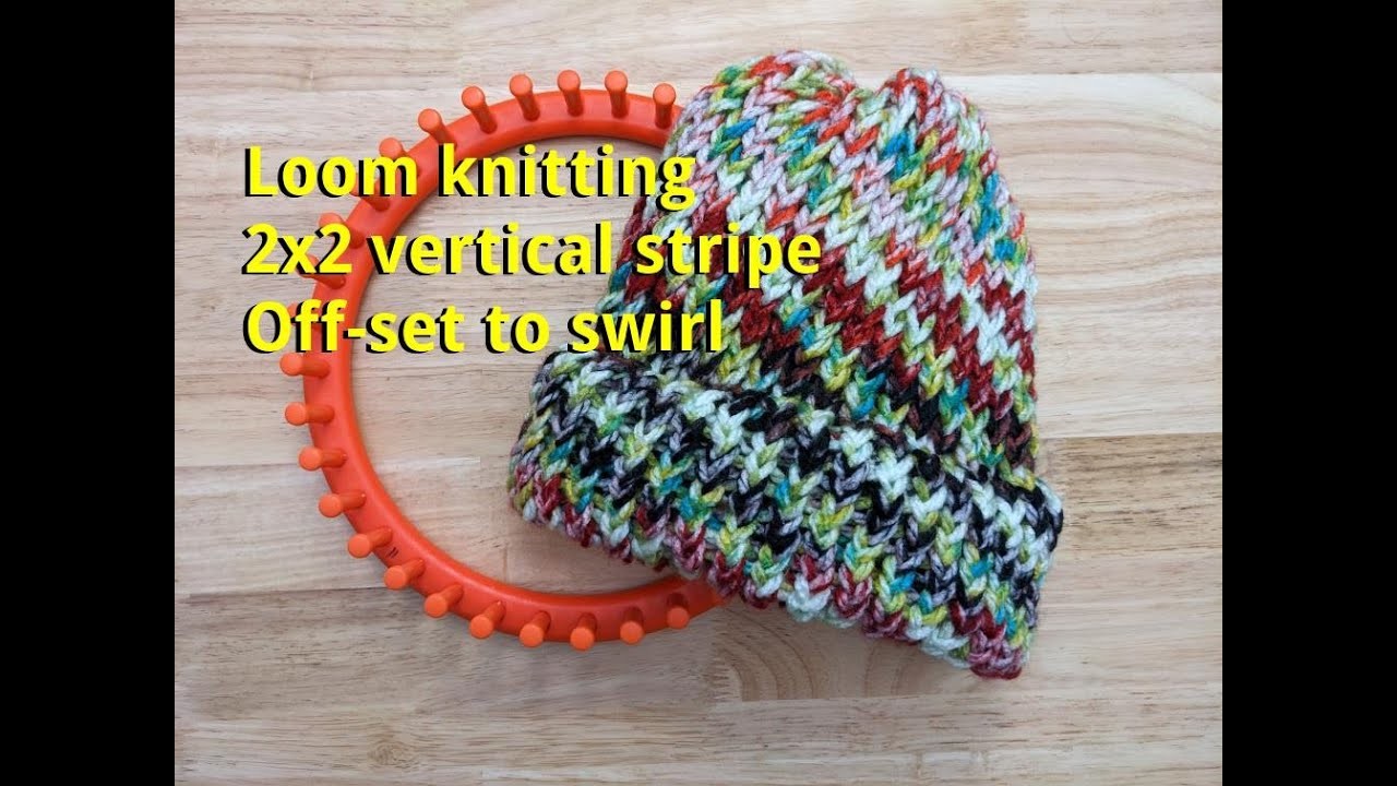 Loom knitting a hat with a 2x2 vertical stripe that swirls!